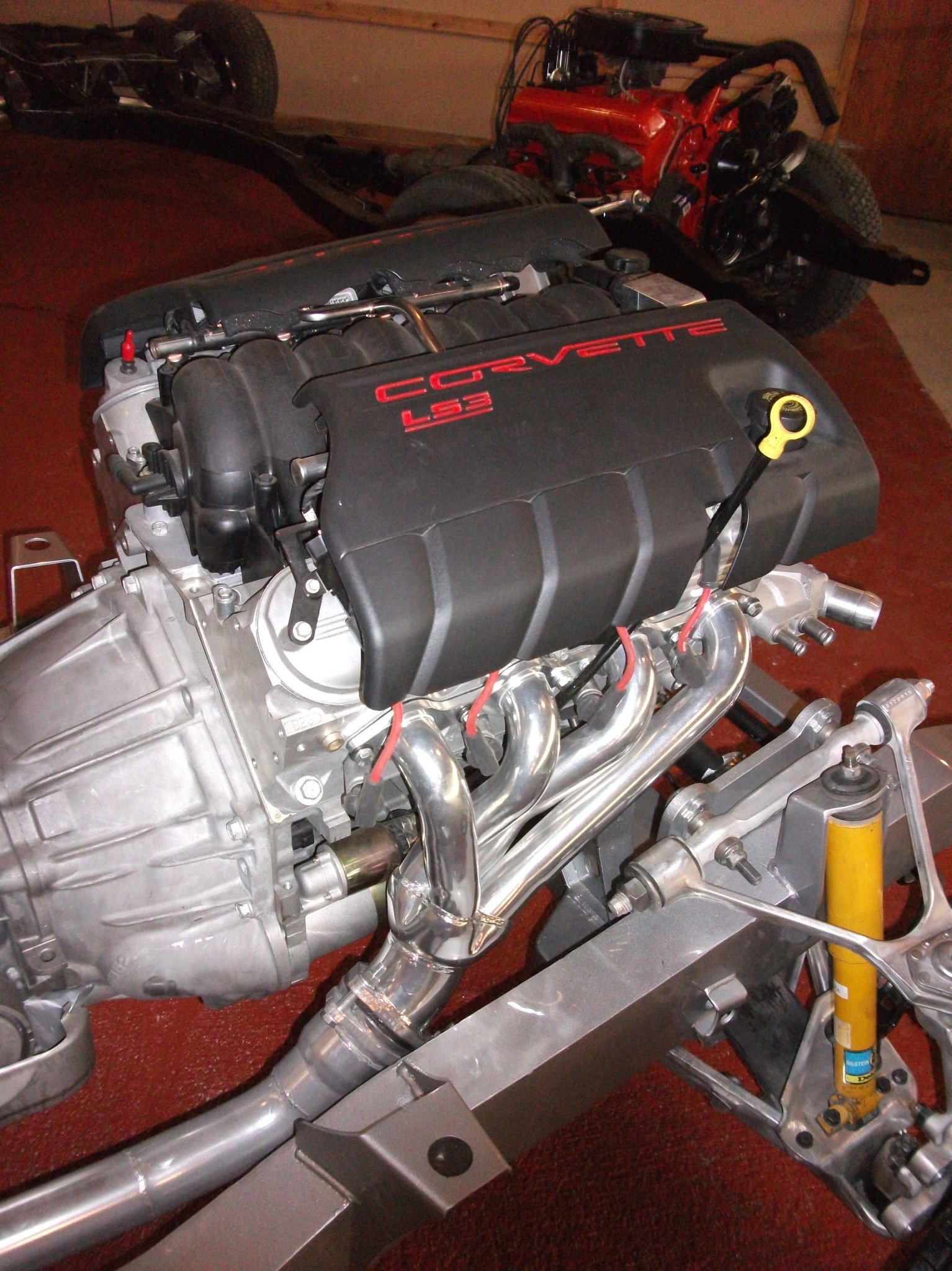 Chevrolet LS3 V8 engine bolted to a transmission in a hot rod chassis (generic LS3 photo, not an Engine Pro part)
